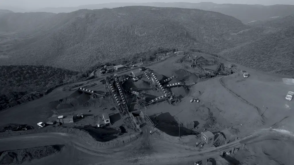 Hilltop crushing and screening operations against the Sandur ranges